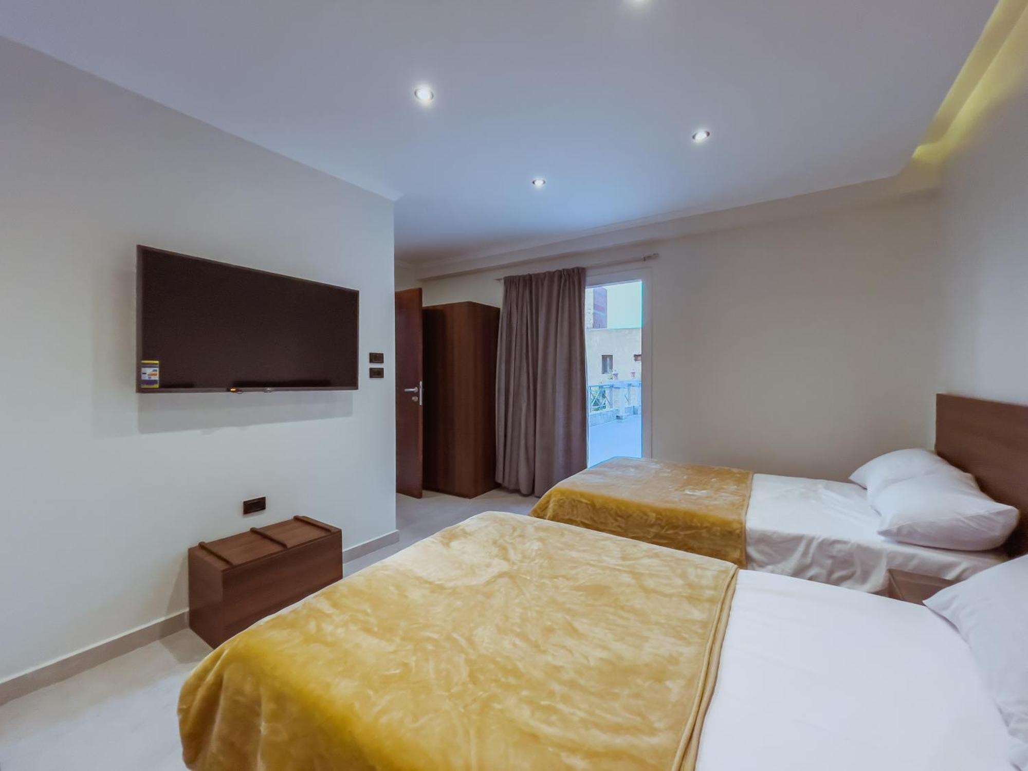 King Khufu Pyramids View Hotel Kafret el-Gabal Kamer foto