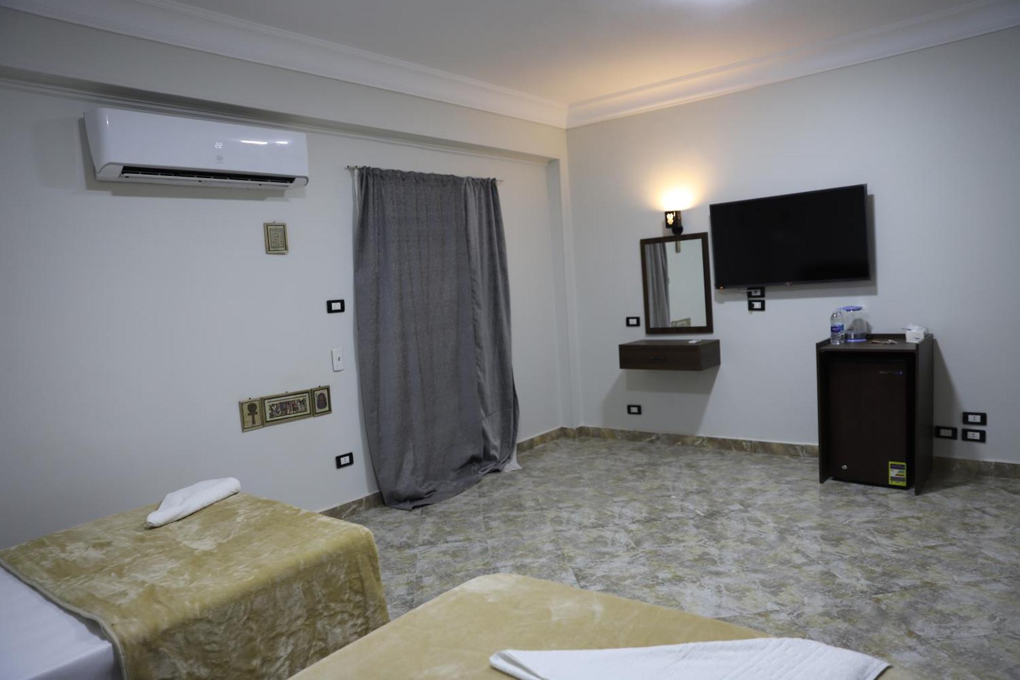 King Khufu Pyramids View Hotel Kafret el-Gabal Kamer foto