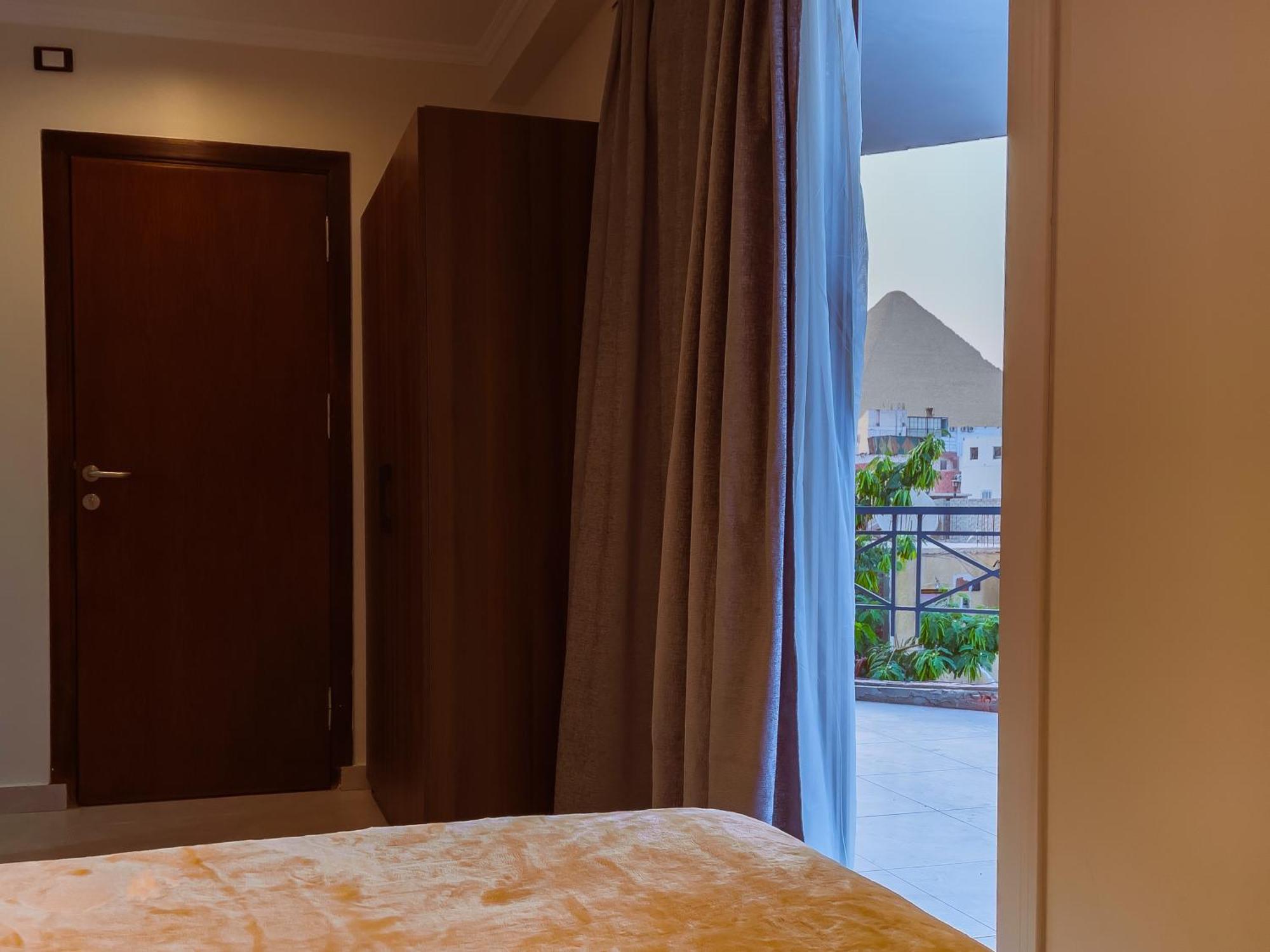 King Khufu Pyramids View Hotel Kafret el-Gabal Kamer foto