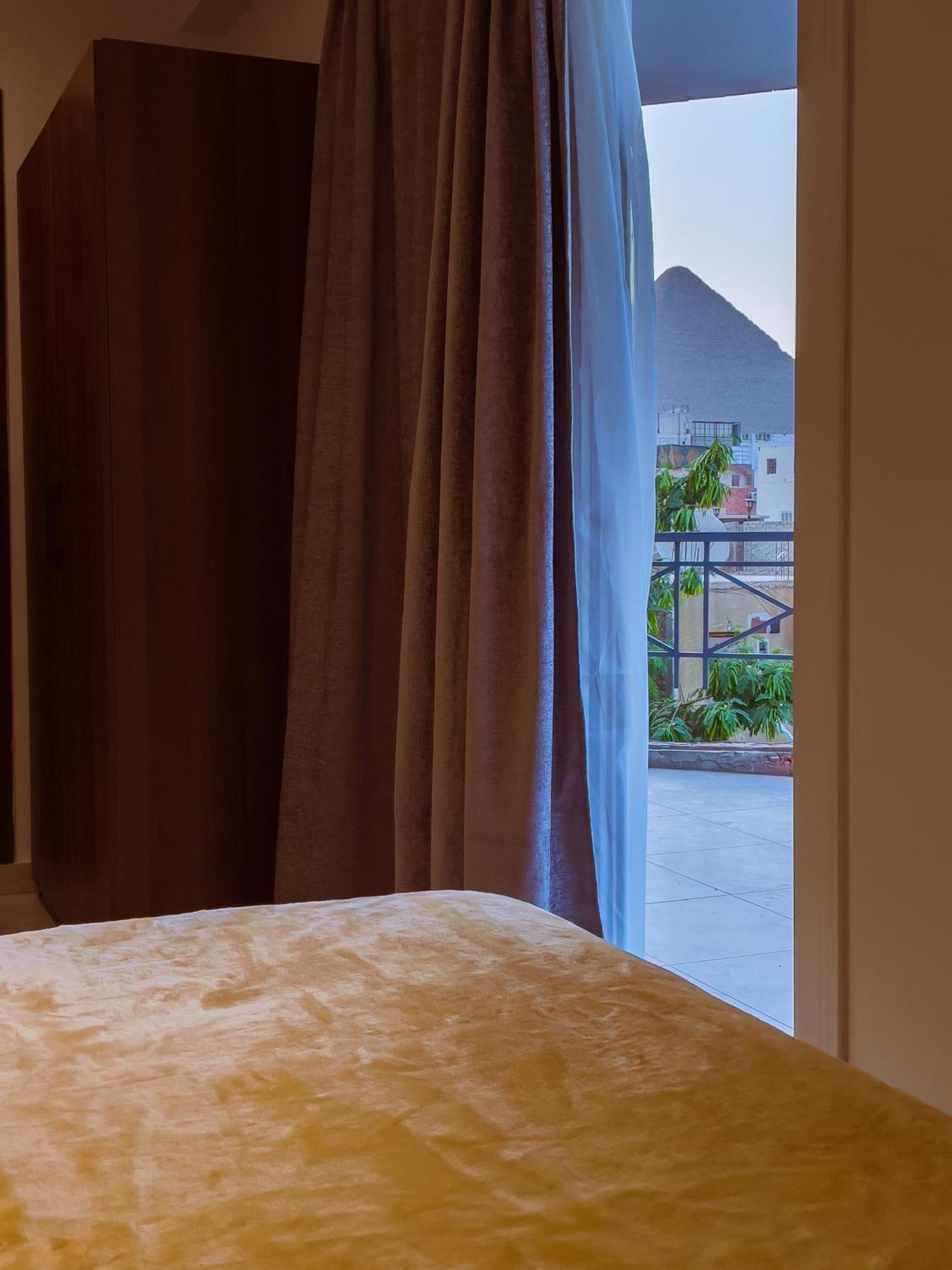 King Khufu Pyramids View Hotel Kafret el-Gabal Kamer foto
